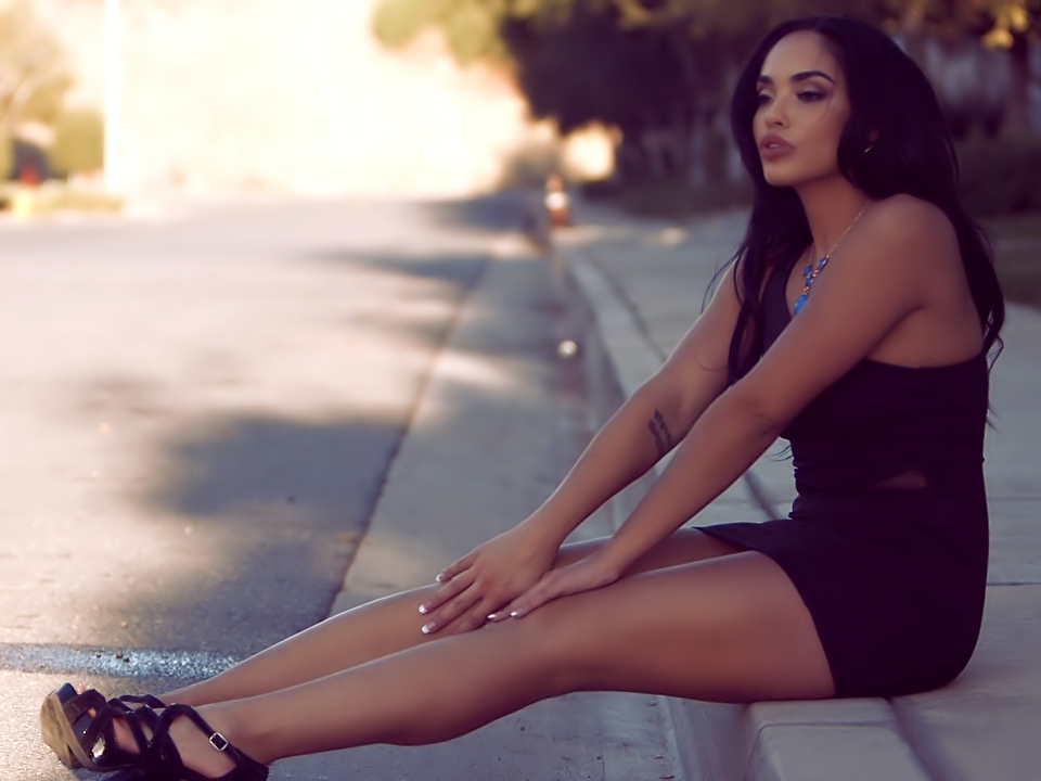 Selena Santana waits on the side of the road for a stud.